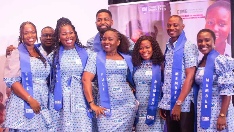CIMG graduates in their sashes